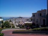 [Photo of Lombard Street with a nice view of San Francisco]