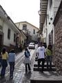[Photo of a street in Cusco]