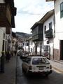 [Photo of a street in Cusco]