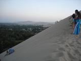 [Photo of sandboarding]